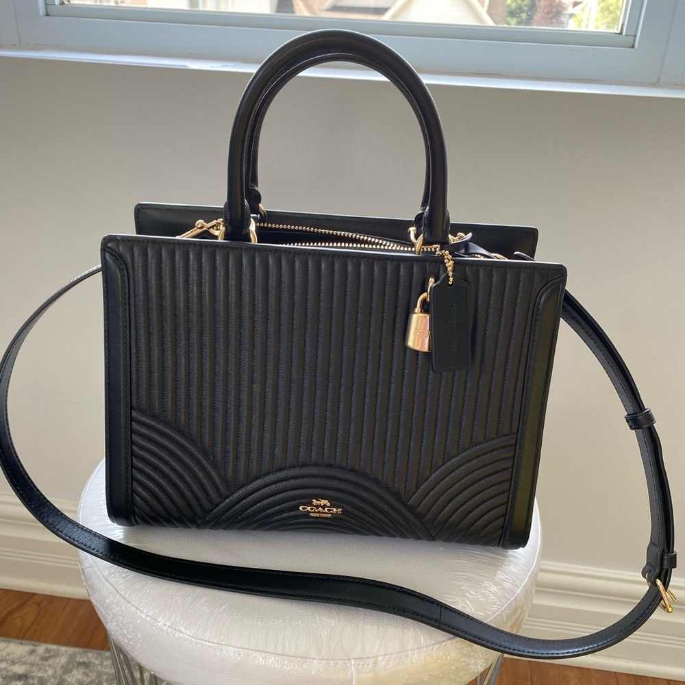 Coach Leather Handbag in Black with crossbody strap barely worn!